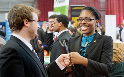 Two people meeting at a conference